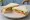 Pork Luncheon Meat and Salad: an illustration of pork, lettuce, tomato and butter on white bread.