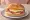 Proino Sandwich (Πρωινό): an illustration of egg, ham and cheese on bread.