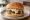 Provel Burger: an illustration of beef on burger bun.
