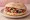 Puccia Salentina: an illustration of tuna, caper, tomato, olives and more.