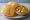 Puri Sabzi: an illustration of potato, onion, tomato and cumin.