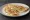 Quesadilla de Queso: an illustration of queso oaxaca on tortilla.
