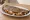 Quesadilla Grande: an illustration of cheese, chicken, beans, sour cream and more on tortilla.