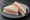 Radish Sandwich: an illustration of radish and butter on white bread.