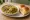 Ragda Pattice Pav: an illustration of potato, onion and cilantro on bread.