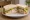 Roast Chicken Sandwich: an illustration of chicken, mayonnaise and lettuce on white bread.