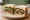 Roast Duck Sandwich: an illustration of duck, cucumber and scallion on white bread.