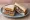 Roast Lamb and Mint: an illustration of lamb, mint and butter on white bread.