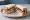 Roast Lamb and Redcurrant: an illustration of lamb and butter on white bread.