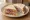 Roast Lamb Sandwich: an illustration of lamb, mint and butter on white bread.