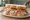 Roast Pork and Crackling: an illustration of pork on white bread.