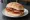 Roll and Bacon: an illustration of bacon and butter.