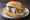 Rollmops Brötchen: an illustration of herring, pickle and onion on kaiser roll.