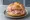 Rosetta con Mortadella: an illustration of mortadella on kaiser roll.