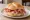 Rosetta con Prosciutto: an illustration of prosciutto on kaiser roll.