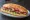 Rozbif Sandviç: an illustration of beef and lettuce on bread.