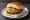 Sabudana Vada Pav: an illustration of potato, pepper, cilantro, cumin and more on bread.