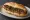 Salchicha Parrillera: an illustration of chimichurri on baguette.