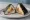 Samgak Kimbap — Spam & Cheese: an illustration of rice, pork, cheese and olive oil.