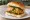 Samosa Pav: an illustration of potato and cumin on bread.