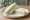 Samsaek — Cucumber Layer (Green): an illustration of cucumber and mayonnaise on white bread.