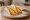 San Antonio Breakfast Taco: an illustration of egg, bacon, chorizo, cheese and more on tortilla.