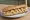Sandwich Aiglefin Fumé: an illustration of butter, lemon and dill on baguette.