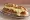 Sandwich Aligot: an illustration of potato, garlic, butter and sausage.