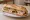 Sandwich Amiénois: an illustration of butter, pickle and mustard on baguette.
