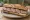 Sandwich Andouille de Guémené: an illustration of butter and pork on baguette.