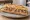 Sandwich Andouillette de Troyes: an illustration of pork on baguette.