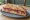 Sandwich au Jambon de Bayonne: an illustration of pork and butter on baguette.