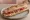 Sandwich au Jambon de Lacaune: an illustration of pork and butter on baguette.