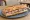 Sandwich au Jambon Persillé: an illustration of ham, pork, parsley and butter on baguette.