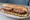 Sandwich au Jésus: an illustration of pork on baguette.