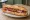 Sandwich au Lonzu: an illustration of pork and butter on baguette.
