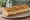 Sandwich au Munster Fermier: an illustration of butter and cumin on baguette.