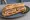 Sandwich au Pâté de Canard d'Amiens: an illustration of duck, pickle and butter on baguette.