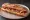 Sandwich au Piment d'Espelette: an illustration of pork and butter on baguette.