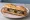 Sandwich au Pounti: an illustration of pork, onion and egg on baguette.