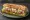 Sandwich au Thon: an illustration of tuna, mayonnaise, lettuce, tomato and more on baguette.