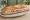 Sandwich Autoroute: an illustration of ham, butter, tuna, mayonnaise and more on baguette.
