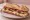 Sandwich Auvergnat: an illustration of pork, butter and pickle on baguette.