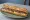 Sandwich aux Anchois: an illustration of anchovy, butter and olive oil on baguette.