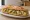 Sandwich aux Artichauts: an illustration of artichoke, olive oil, lemon and garlic on baguette.