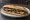 Sandwich aux Aubergines: an illustration of eggplant, olive oil and garlic on baguette.