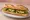 Sandwich aux Courgettes: an illustration of olive oil and garlic on baguette.