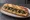 Sandwich aux Escargots: an illustration of butter, garlic and parsley on baguette.