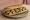 Sandwich aux Moules: an illustration of butter, garlic and parsley on baguette.