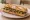 Sandwich aux Olives de Nîmes: an illustration of olive oil and butter on baguette.